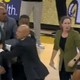 Vanderbilt coach Jerry Stackhouse restrained by security during heated ejection