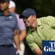 Rory McIlroy takes lead at US PGA as Tiger Woods struggles with leg pain