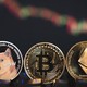 Bitcoin (BTC), Ethereum (ETH) Slip, Dogecoin (DOGE) Jumps - Benzinga
