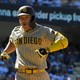 Padres rally in 9th to hang tough in NL West